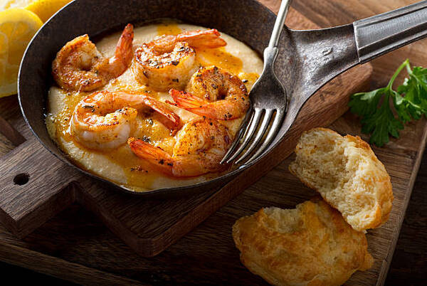 5 Irresistible Shrimp Keto Recipes for Low-Carb Dinners 2 A pan of delicious fresh homemade cajun style shrimp and grits with cheddar biscuit