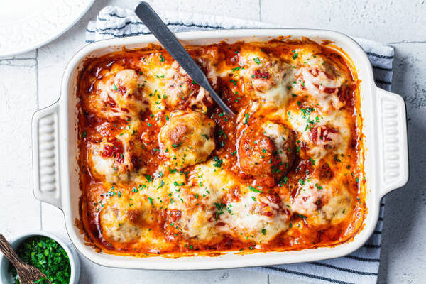 Delicious BBQ Chicken Casserole Recipe for Family Dinners 6 Baked cheesy meatballs casserole with tomato sauce in a baking dish
