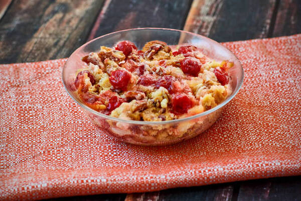 Delicious Keto Dump Cake Recipe for Dessert Lovers 2 Cherry dump cake served in a glass bowl