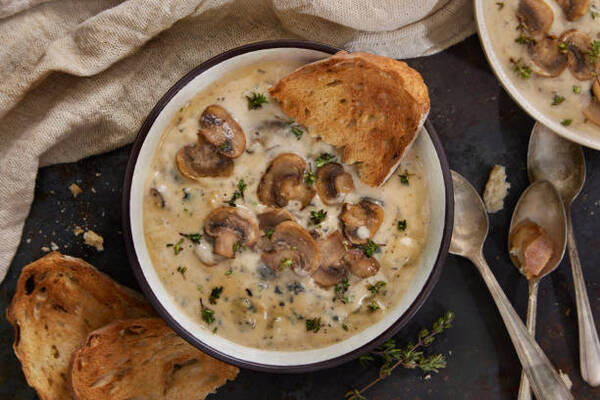 Easy Keto Mushroom Soup That’s Rich, Filling, and Low-Carb 3 Creamy mushroom soup served with toasted French bread