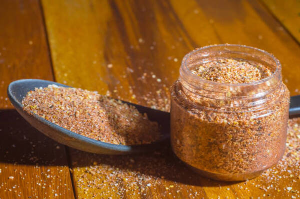 Best Rub for Ribs That Brings Big BBQ Flavor Fast 3 Dry rub for ribs in a small container jar