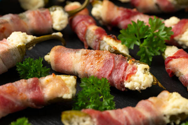 Easy Keto Jalapeno Poppers Recipe for a Spicy Snack 5 Bacon-wrapped jalapeno poppers with cream cheese and herbs