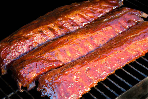 Best Rub for Ribs That Brings Big BBQ Flavor Fast 10 Smoked baby back ribs on a grill