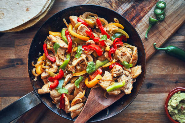 Chilis Keto Menu Choices That Keep You on Track 4 Chicken fajitas in tortillas with onions and peppers