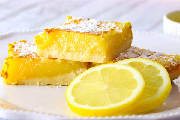 10 Keto Dessert Recipes Easy Enough for Beginners 6 Homemade lemon bars with lemon slices on the side