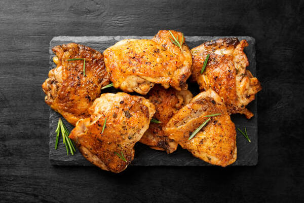 Calories in Chicken Thigh Made Simple: Nutrition Breakdown 7 Grilled chicken thighs with spices and lemon
