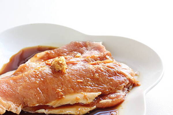 Easy 4-Ingredient Oven-Baked Pork Chops for Busy Nights 5 Pork chops marinated in soy sauce with ginger
