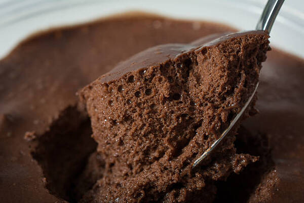 Easy Keto Chocolate Mousse Recipe for a Quick Dessert Fix 5 Close up of dark chocolate mousse on a spoon ready to eat