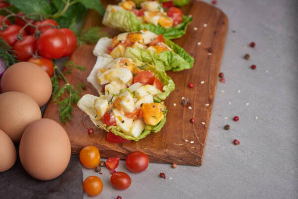 Easy Egg Salad Lettuce Wrap Recipe for a Quick Lunch 7 Egg salad with tomatoes wrapped in lettuce