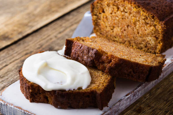Soft and Moist Keto Pumpkin Bread You’ll Want Every Fall 5 Homemade pumpkin bread with cream cheese icing sliced and ready to eat