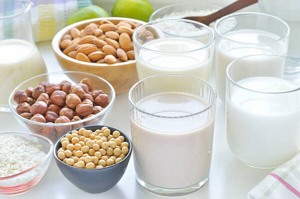 Is Lactose-Free Milk Keto? Benefits, Drawbacks, and Tips 6 Hazelnut, rice, soya and almond milk in glasses to substitute for dairy milk.