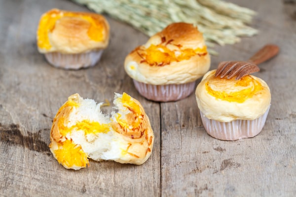 Keto Egg Cups: A Quick Breakfast Solution 9 Freshly baked keto egg cups with a soft, fluffy texture and golden cheese topping