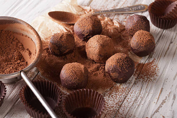 10 Delicious Keto-Friendly Candy Options to Buy or Make 10 Chocolate truffles sprinkled with cocoa powder