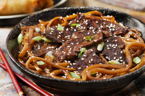 Easy Mongolian Beef Recipe You Can Make at Home Tonight 6 Mongolian Beef with Shanghai noodles, dumplings and spring roll