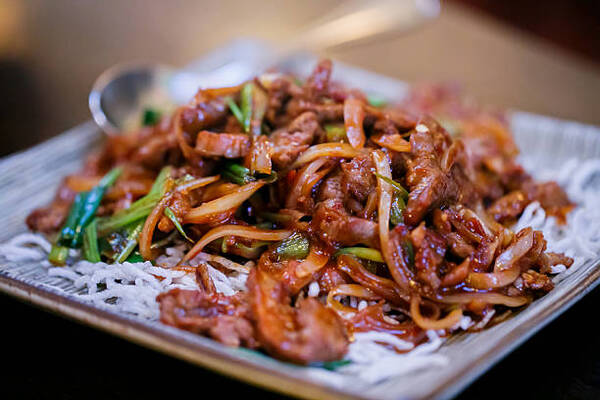 Easy Mongolian Beef Recipe You Can Make at Home Tonight 5 Mongolian beef served with rice and vegetables