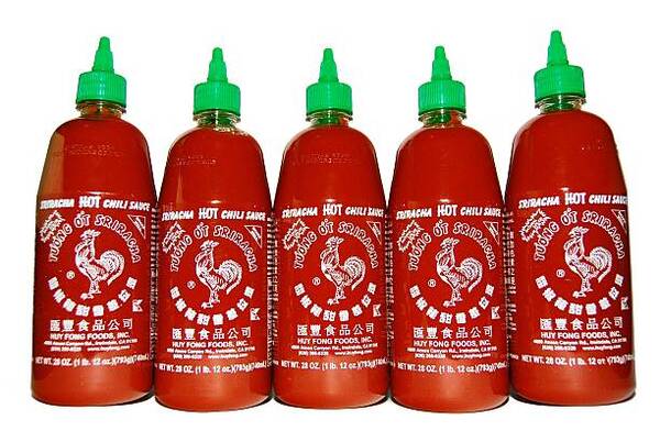 Bottles of popular sriracha hot sauce